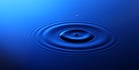 Drop of water falling into the water and leaving it circles.